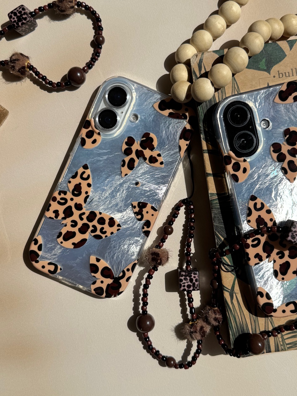 2c9432.jpeg قاب پروانه با بال های پلنگی همراه با آویز (کدC2100) - Image 1