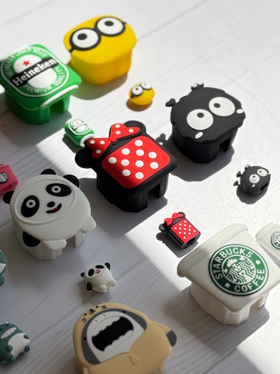 8e7d80.jpeg محافظ آداپتور 20 وات عروسکی سیلیکونی (4 تکه) (کدa0162) - Image 1