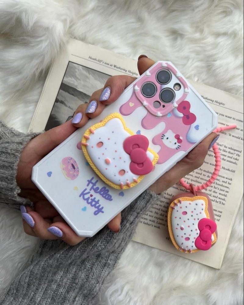 قاب موبایل آیفون هلوکیتی سفید صورتی + پاپ سوکت قاب موبایل آیفون هلوکیتی سفید صورتی + پاپ سوکت - Image 1